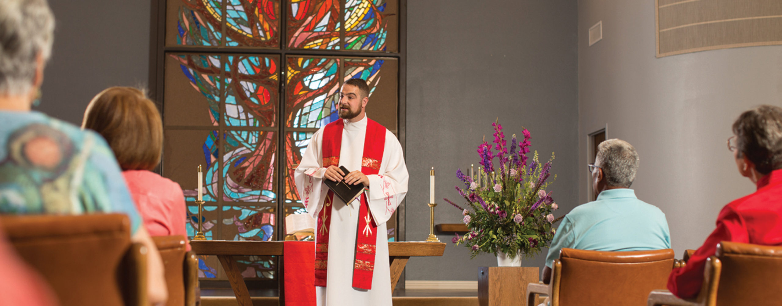 spiritual leader leads a sermon in their place of worship